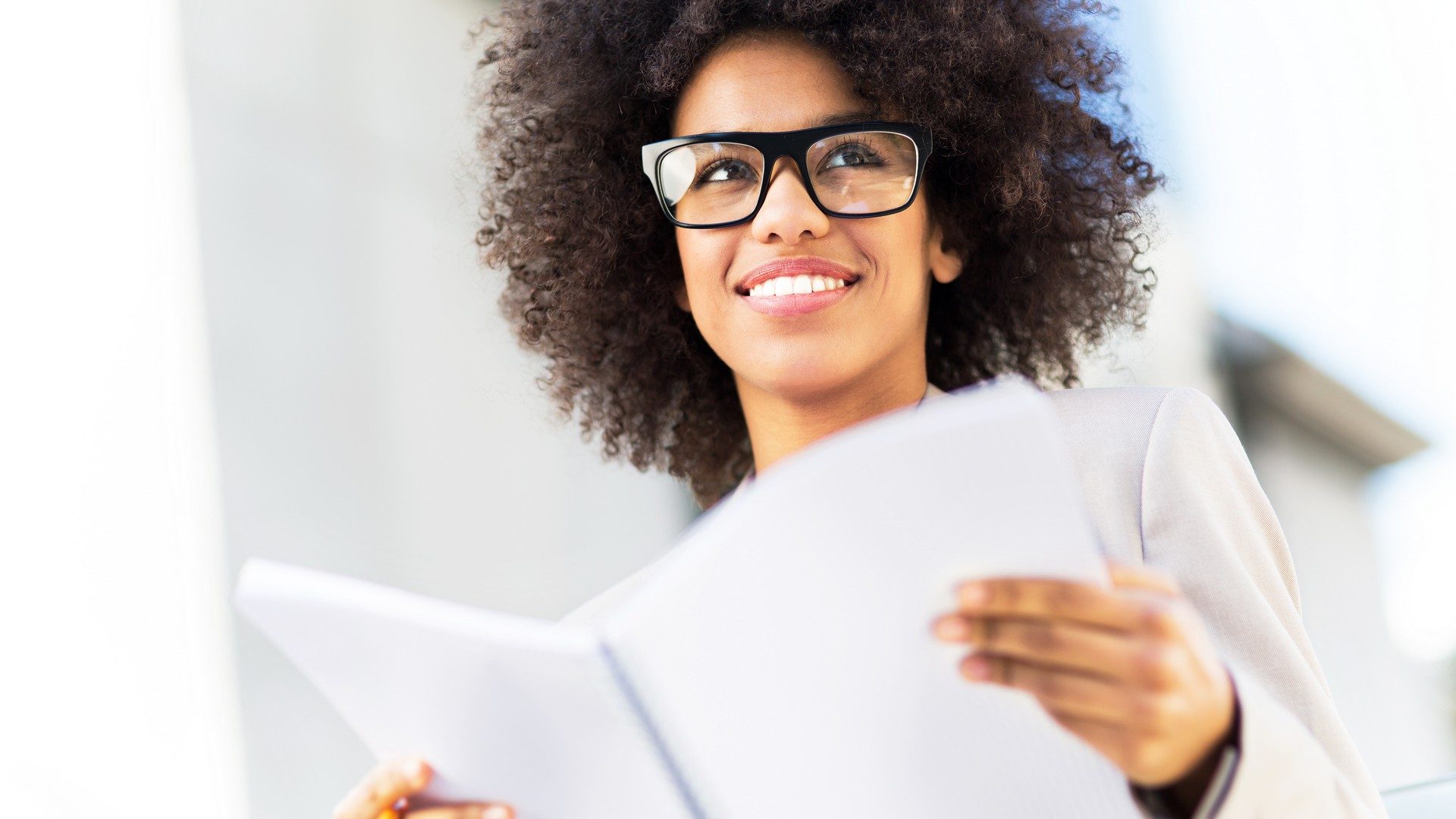 Young businesswoman with afro hair